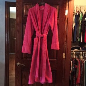 Pink fuzzy bathrobe